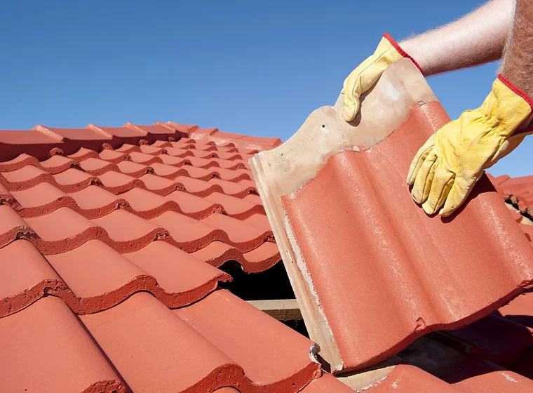 Roof repair — tiles and flashing