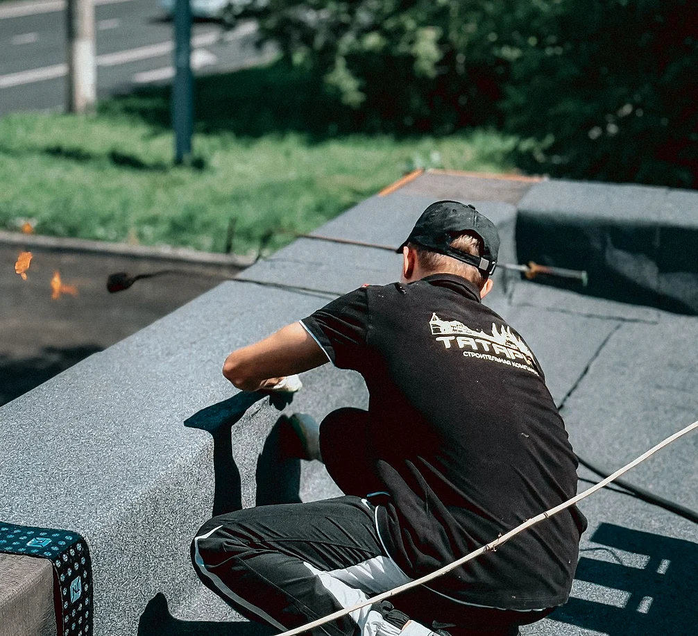 Roofer at work